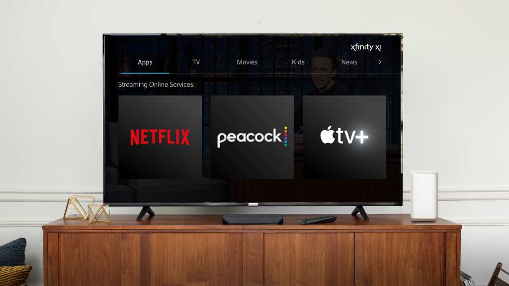 A TV running Comcast's Xfinity X1 platform with Netflix, Peacock, and Apple TV+ logos