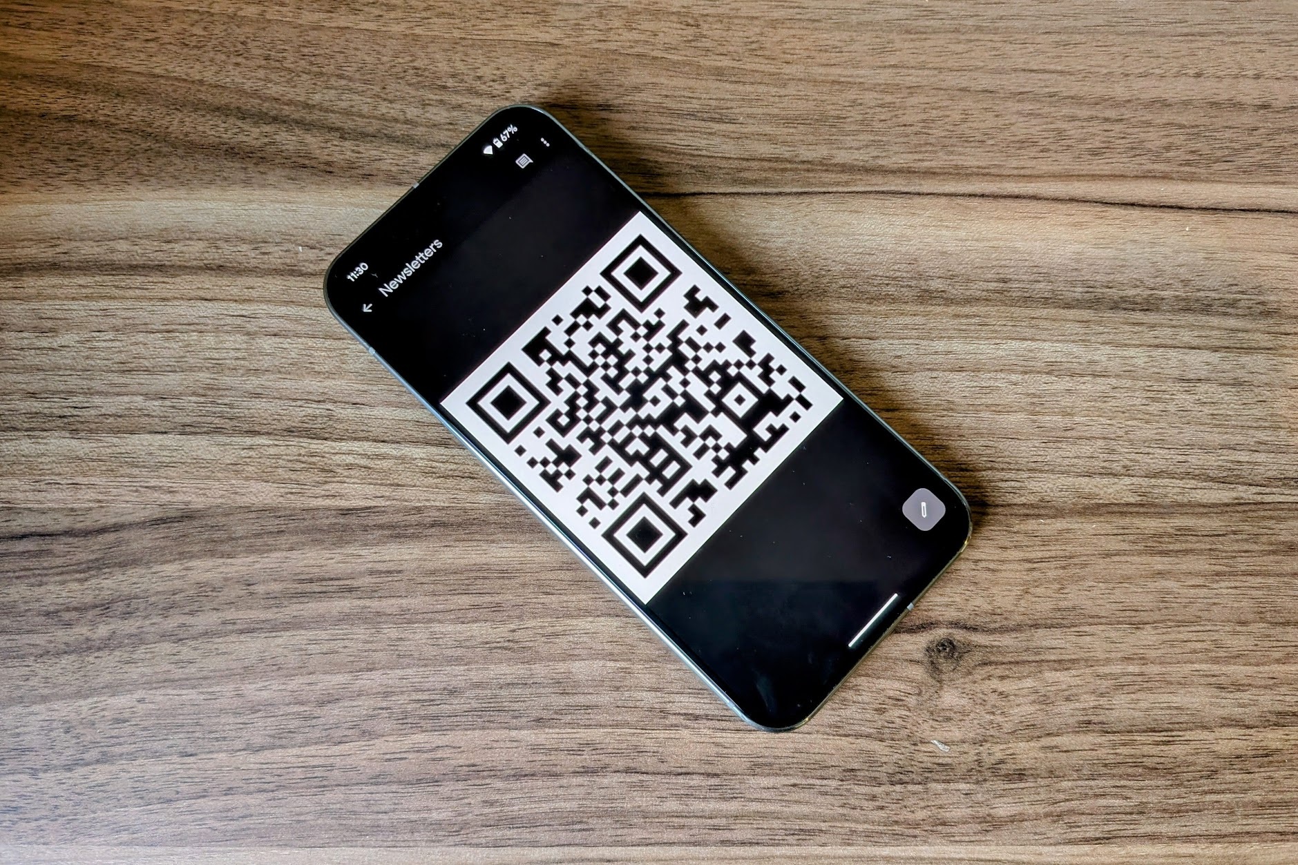 A smartphone displaying a QR code